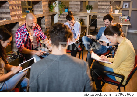 Colleagues in a meeting 27963660