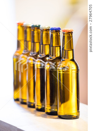 Close-up of sealed beer bottles Close-up of sealed beer bottles 27964705