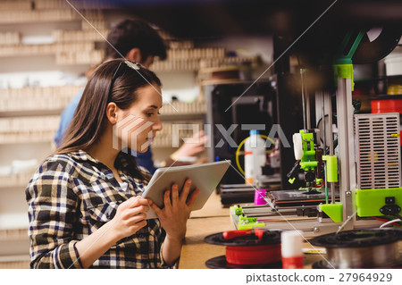 Graphic designer using digital tablet Graphic designer using digital tablet 27964929