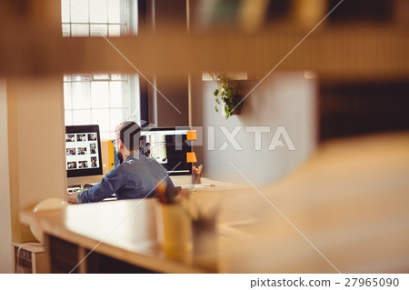 Graphic designer using a graphics tablet 27965090