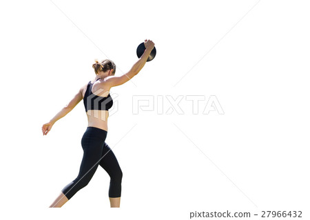 Side view of sporty woman preparing her discus throw 27966432