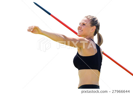 Portrait of happy sportswoman is practising javelin throw 27966644