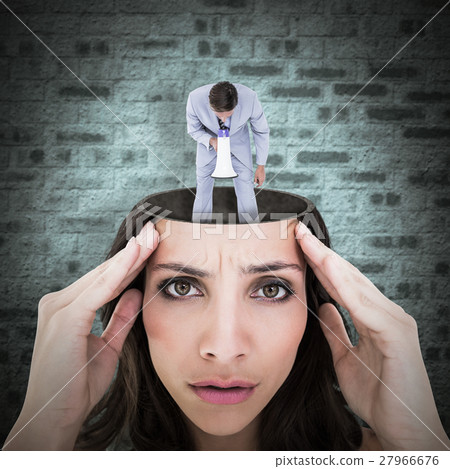 Composite image of businessman talking through megaphone 27966676