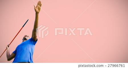 Composite image of low angle view of sportsman practising javelin throw 27966761