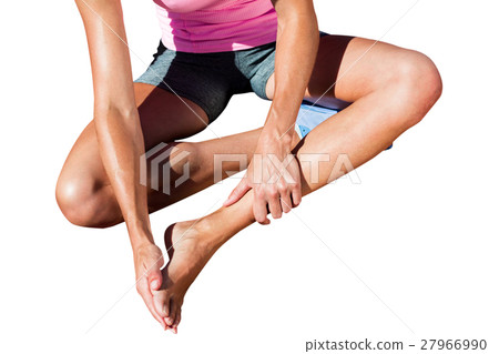 Close up of sportswoman is hurting her foot 27966990