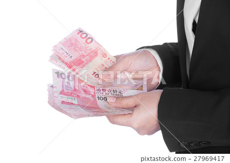 woman in suit with Hong Kong Dollar money 27969417