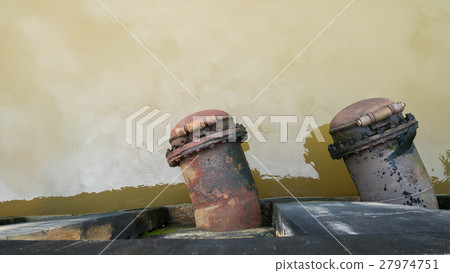 Water discharge pipe  canal in the city 27974751