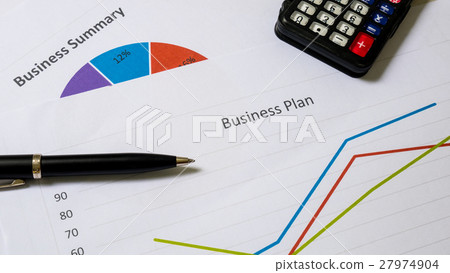 business report or Financial paper with pen  27974904