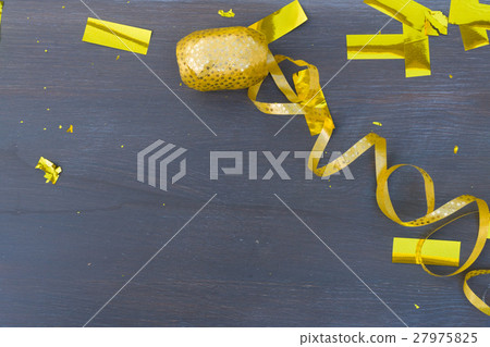 Masquerade decorations on dark wooden background Masquerade decorations on dark wooden background 27975825