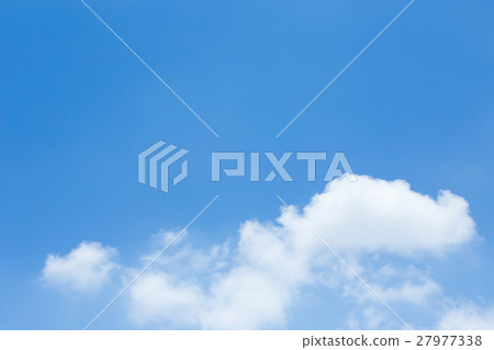 fluffy white cloud on clear blue sky background 27977338