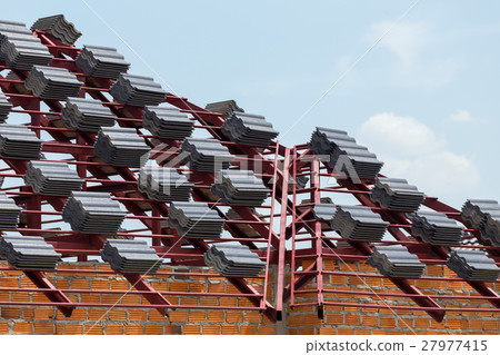 black tile roof on residential building black tile roof on residential building 27977415