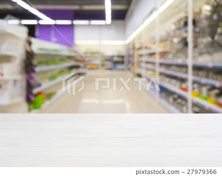 Wooden board empty table over blur in supermarket Wooden board empty table over blur in supermarket 27979366