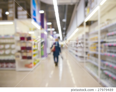 Abstract blurred supermarket aisle with shelves Abstract blurred supermarket aisle with shelves 27979489