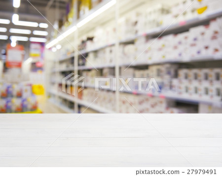 Wooden board empty table over blur in supermarket Wooden board empty table over blur in supermarket 27979491