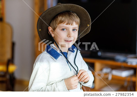 Portrait of little school kid boy wearing cowboy 27982354