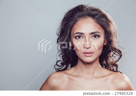 Brunette girl with shiny wavy hair and beautiful Brunette girl with shiny wavy hair and beautiful 27985329