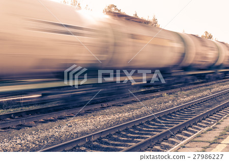 Train with oil tanks moving. 27986227