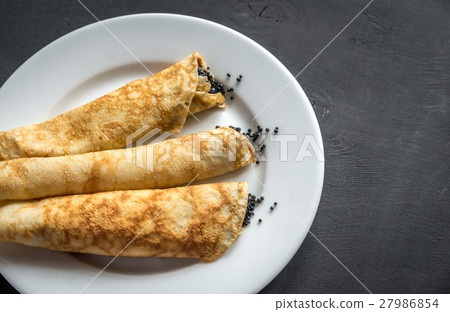 Crepes with black caviar Crepes with black caviar 27986854