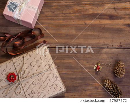 Vintage gift box, fir cones with Christmas toy on Vintage gift box, fir cones with Christmas toy on 27987572