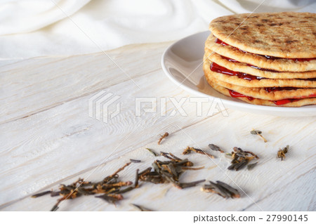 leaves of green tea and pancakes with jam leaves of green tea and pancakes with jam 27990145