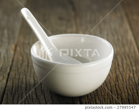 bowl with spoon 27995547