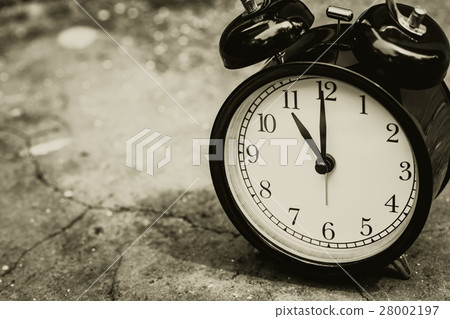 old retro clock sepia color at 11 o'clock. old retro clock sepia color at 11 o'clock. 28002197