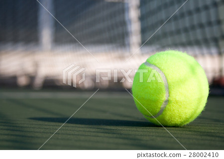 Tennis ball on hard court Tennis ball on hard court 28002410