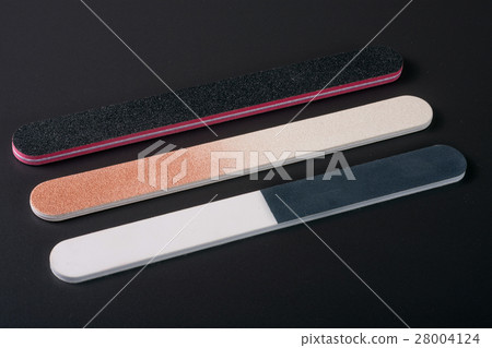 Three nail file with a different abrasive on dark 28004124