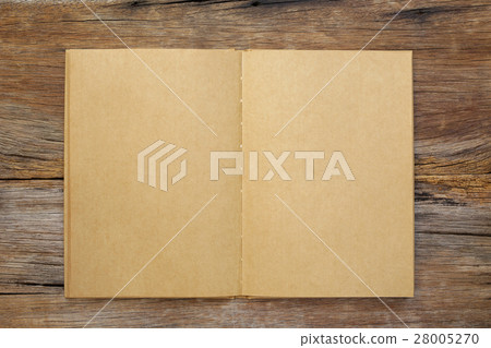 Notebook  on wooden table 28005270