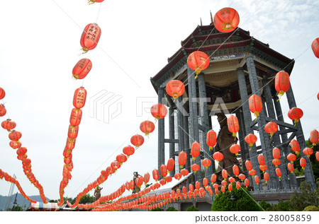 Guanyin and a red lanterns in Chinese Temple  28005859