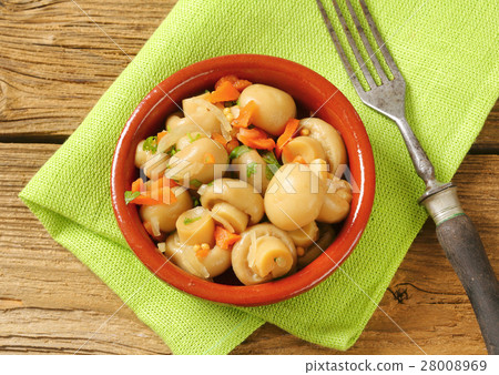 bowl of pickled champignons 28008969