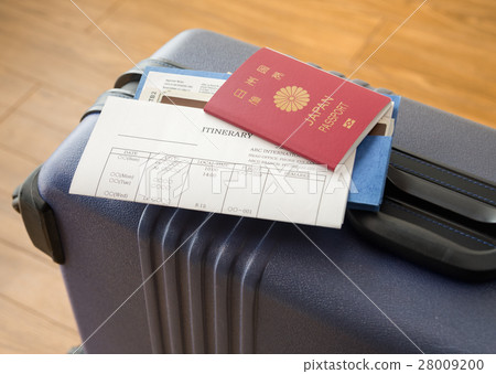 Traveling abroad Overseas travel Passport itinerary travel suitcase 28009200
