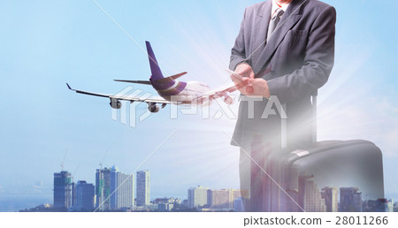 man in airport with luggage 28011266