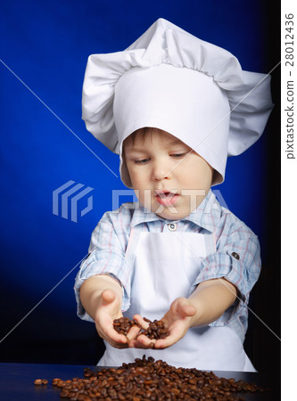 little boy checking coffee grains little boy checking coffee grains 28012436