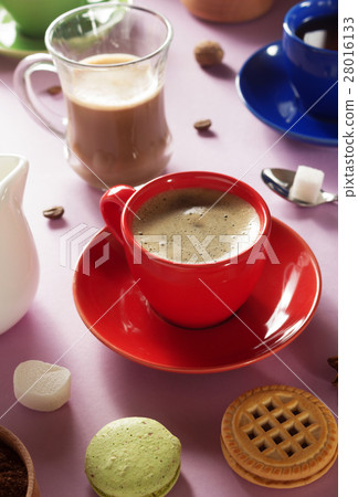 cup of coffee, tea and cacao at purple background 28016133