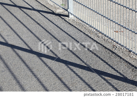 shadow of meta rails on the street 28017181