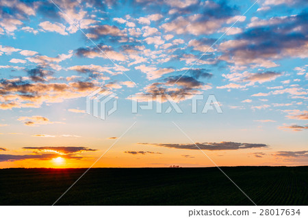 Sunset Sunrise Over Field Or Meadow. Bright Sunset Sunrise Over Field Or Meadow. Bright 28017634