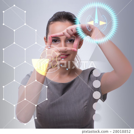 Businesswoman pressing virtual buttons in business Businesswoman pressing virtual buttons in business 28018852