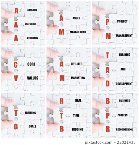 Hand of business man completing the puzzle 28021433