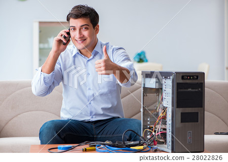 Happy customer resolving his computer problem Happy customer resolving his computer problem 28022826