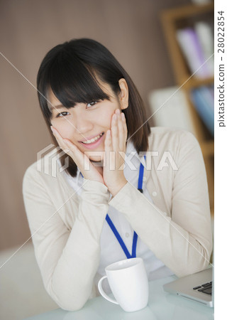 Businesswoman with a cheeks stick 28022854