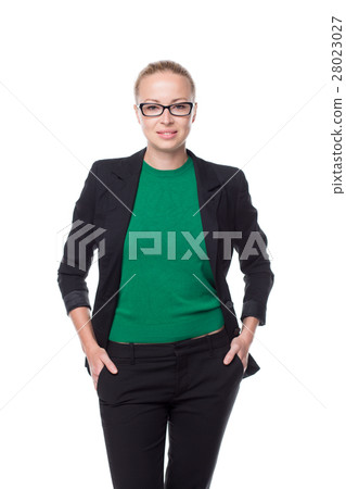 Business woman standing arms in pockets against 28023027