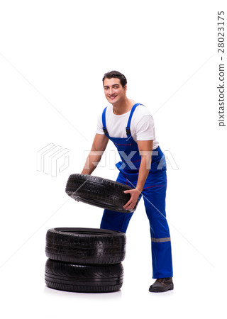 Handsome tyre repairman isolated on white Handsome tyre repairman isolated on white 28023175