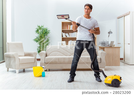 Man husband cleaning the house helping wife 28023200
