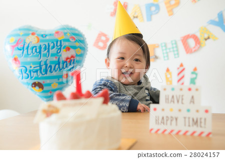 Baby celebrating 1 year old birthday Baby celebrating 1 year old birthday 28024157