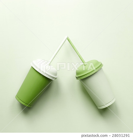 Two plastic cups on green. Greenery love art 28031291