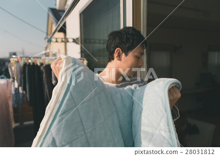 drying a futon, housekeeping, person 28031812