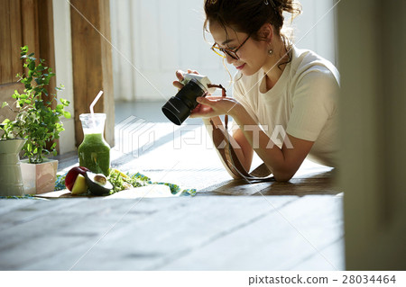 A woman taking home cooking dishes A woman taking home cooking dishes 28034464