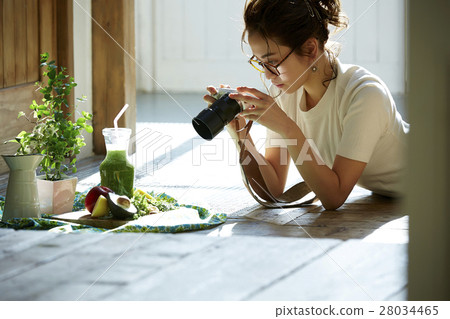A woman taking home cooking dishes A woman taking home cooking dishes 28034465