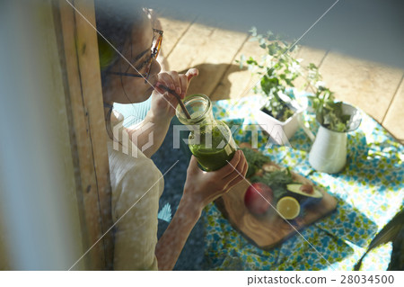 A woman relaxing at home 28034500